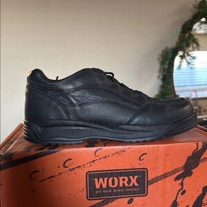 Works by Red‎ wing black leather Worx by Red Wing safety toe athletic shoes.